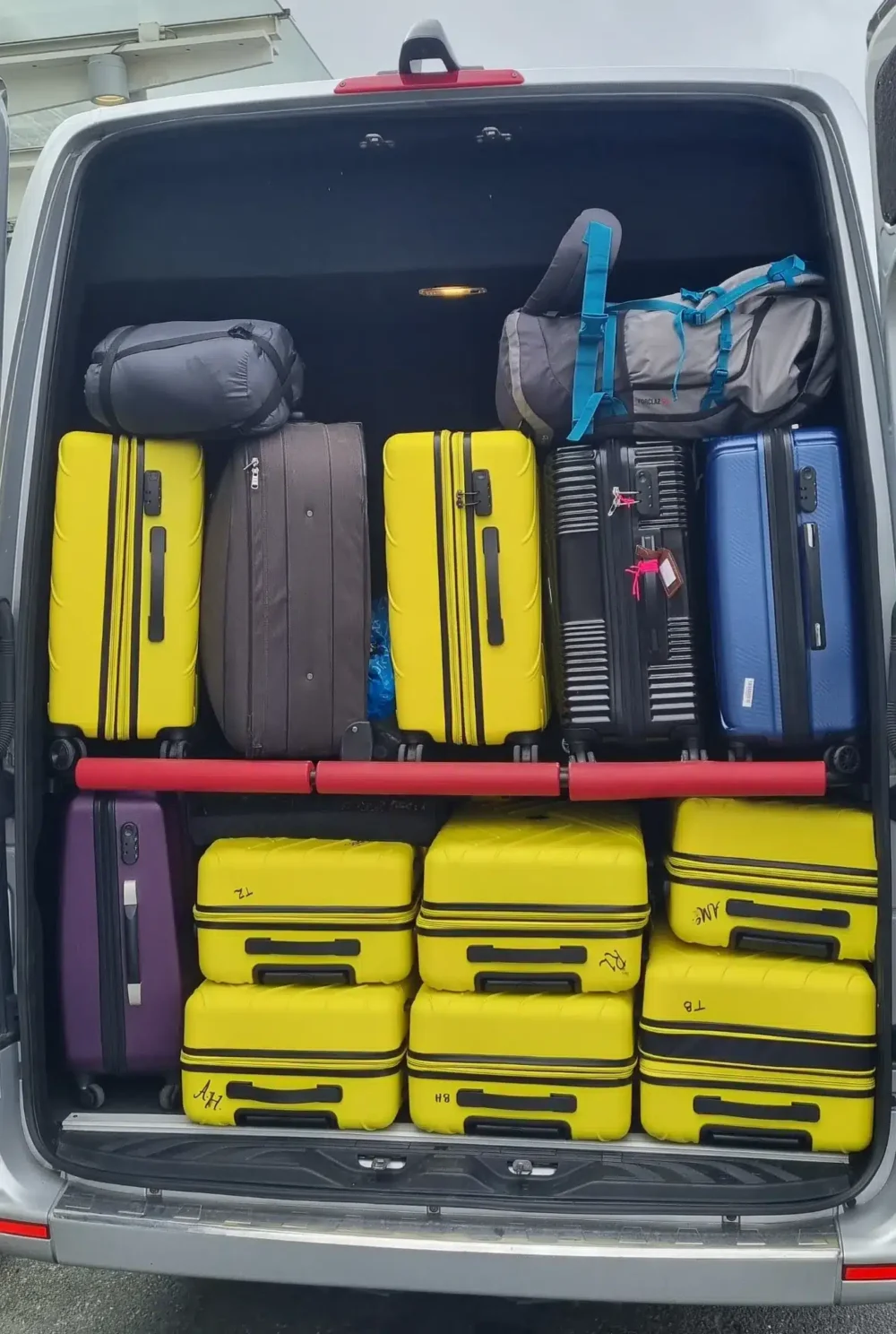 Spacious luggage area in a West London Minibus Hire vehicle for luxury travel and professional comfort in London.