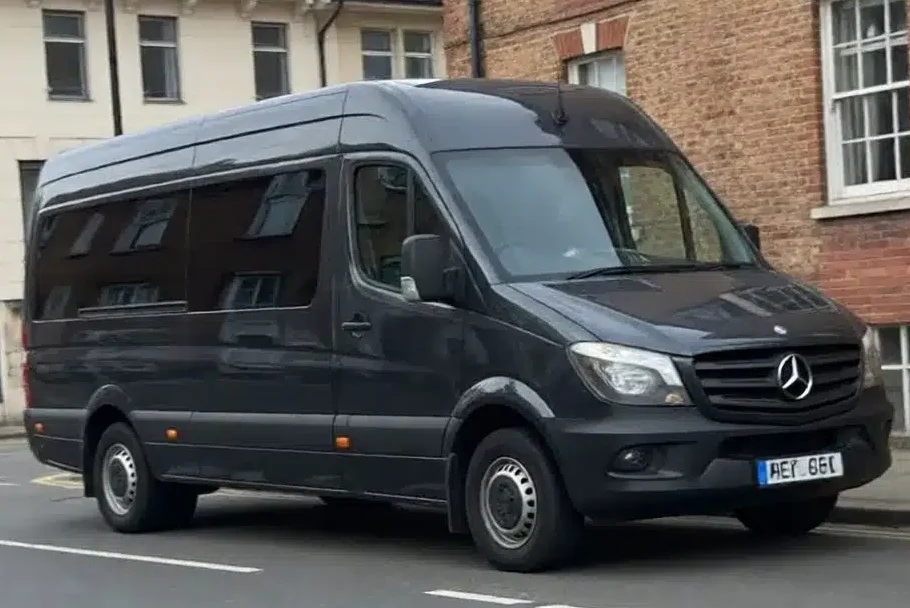 Luxury minibus by West London Minibus Hire showcasing travel comfort and professionalism in the streets of London.